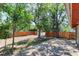 Backyard featuring a wood deck, lush greenery, a private wooden fence, and ample space for outdoor enjoyment at 760 S 42Nd St, Boulder, CO 80305