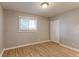 Well-lit bedroom with hardwood floors, a window for natural light, and a closet for storage solutions at 760 S 42Nd St, Boulder, CO 80305