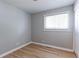 Cozy bedroom featuring hardwood floors, natural light from a window, and ample space for relaxation and personalization at 760 S 42Nd St, Boulder, CO 80305