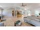 Expansive living space featuring hardwood floors, a vaulted ceiling, and seamless flow to the kitchen at 760 S 42Nd St, Boulder, CO 80305
