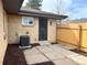 Enclosed backyard area with patio and mature trees at 2812 N Harrison St, Denver, CO 80205