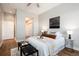 Comfortable bedroom with a plush bed and stylish decor at 6000 W Floyd Ave # 307, Denver, CO 80227