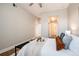 Bright bedroom featuring hardwood floors and closet at 6000 W Floyd Ave # 307, Denver, CO 80227