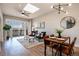 Living room with balcony and natural light at 6000 W Floyd Ave # 307, Denver, CO 80227