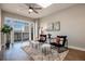 Living room with large windows showcasing the natural light at 6000 W Floyd Ave # 307, Denver, CO 80227