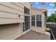 Back of house view featuring a deck, fenced yard and tasteful landscaping at 4592 Malaya St, Denver, CO 80249