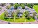 Aerial view showcases mature trees and well-manicured landscaping throughout the residential community at 1216 S Uvalda St, Aurora, CO 80012