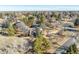 Wide aerial view of a single Gathering home with mature landscaping in a lovely neighborhood at 4747 E Mansfield Ave, Englewood, CO 80113