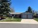 Charming single story home featuring brick accents and a two-car garage at 3762 S Fenton Way, Denver, CO 80235