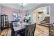 Cozy dining room featuring a wooden table with seating for eight and a decorative fish tank at 9990 Jasper St, Commerce City, CO 80022