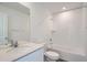 Bright bathroom with a tub and shower combination and modern fixtures at 15277 Fillmore St, Thornton, CO 80602