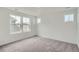 Cozy bedroom with soft carpet, natural light, and neutral paint at 15277 Fillmore St, Thornton, CO 80602