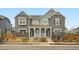 Charming duplex with a cozy front porch and well-maintained landscaping at 15277 Fillmore St, Thornton, CO 80602