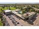Aerial view of the commercial buildings and golf course of the property at 9300 E Center Ave # 2B, Denver, CO 80247