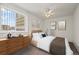 Well-lit bedroom featuring a large window and modern decor at 9300 E Center Ave # 2B, Denver, CO 80247