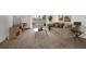 Bright living room with a comfortable couch and a sliding glass door for balcony access at 9300 E Center Ave # 2B, Denver, CO 80247
