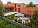 Aerial view of the property showcasing its backyard, patio, and well-manicured landscaping at 1188 S Sherman St, Denver, CO 80210