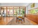 A spacious dining room with sliding glass doors, leading to a patio seating area at 1188 S Sherman St, Denver, CO 80210