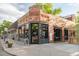 Charming street view of a neighborhood business district with brick buildings and storefronts at 1188 S Sherman St, Denver, CO 80210