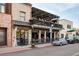 Exterior view of a restaurant with a shaded upper balcony and street parking at 1188 S Sherman St, Denver, CO 80210