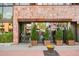 Contemporary exterior view of Izakaya restaurant showing the storefront and front sidewalk seating area at 1188 S Sherman St, Denver, CO 80210