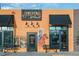 Exterior of Adelita's Cocina Y Cantina with benches and a mural of a lady on a horse at 1188 S Sherman St, Denver, CO 80210