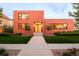 Striking contemporary home featuring a bold red brick exterior and well-manicured front lawn at 1188 S Sherman St, Denver, CO 80210