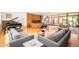 Open concept living space with modern decor, natural light, and a grand piano at 1188 S Sherman St, Denver, CO 80210