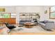 Bright, modern living room with stylish furniture and warm hardwood floors at 1188 S Sherman St, Denver, CO 80210