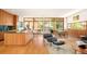 Spacious open concept living space with modern kitchen, dining area, and grand windows at 1188 S Sherman St, Denver, CO 80210