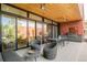 Outdoor patio with seating, grill, and wood ceilings that seamlessly blends indoor/outdoor living at 1188 S Sherman St, Denver, CO 80210