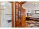 Modern bathroom with jacuzzi tub adjacent to bedroom with hardwood floors at 3777 Newton St, Denver, CO 80211