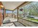 Charming front porch with wood railing and shade at 3777 Newton St, Denver, CO 80211