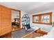 Home office with hardwood floors, natural light, and adjacent bedroom at 3777 Newton St, Denver, CO 80211