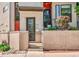 Charming multi-level home featuring brick accents and an inviting front entrance with minimalist landscaping at 1932 W 32Nd Ave, Denver, CO 80211