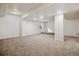 A finished basement with carpet and recessed lighting, with a small window at 2601 Pemberly Ave, Highlands Ranch, CO 80126