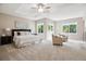Serene main bedroom with neutral tones, tray ceiling, and large windows for ample natural light at 2601 Pemberly Ave, Highlands Ranch, CO 80126
