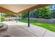 Back patio features a built-in firepit and lush landscaping at 2601 Pemberly Ave, Highlands Ranch, CO 80126