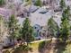 Aerial view of a well-maintained townhome complex with mature trees and landscaping at 4027 E Geddes Cir, Centennial, CO 80122