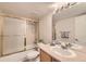 Functional bathroom featuring a shower-tub, toilet, and single sink vanity at 4027 E Geddes Cir, Centennial, CO 80122