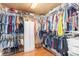 Walk-in closet with ample hanging space and shelving at 10068 Darwin Ln, Highlands Ranch, CO 80130