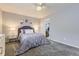 Bedroom featuring a plush bed, carpeted floors, and serene decor, creating a calming retreat at 5426 S Jasper Way, Centennial, CO 80015