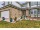 Charming home with a well-maintained front yard, featuring brick accents and beautiful landscaping at 5426 S Jasper Way, Centennial, CO 80015