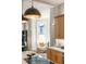 Bright kitchen featuring updated cabinets and a window nook at 2355 N Emerson St, Denver, CO 80205