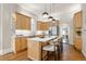 Modern kitchen features stainless steel appliances, a large island, and beautiful light wood cabinets at 2355 N Emerson St, Denver, CO 80205