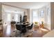 Bright living room with hardwood floors, large windows, and stylish decor perfect for entertaining and relaxation at 2355 N Emerson St, Denver, CO 80205