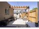 Private outdoor patio area with pergola and seating, ideal for relaxing or hosting gatherings at 2355 N Emerson St, Denver, CO 80205