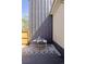 Outdoor patio with modern furniture and a patterned rug at 2355 N Emerson St, Denver, CO 80205