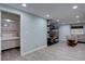 Finished basement featuring a bed and a lounging area at 7715 S Hudson Ct, Centennial, CO 80122
