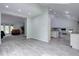 Open concept living spaces create the perfect flow for entertaining with recessed lighting at 7715 S Hudson Ct, Centennial, CO 80122